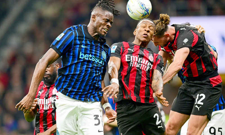 Milan edge Inter in derby to keep distant title chase alive