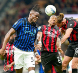 Milan edge Inter in derby to keep distant title chase alive