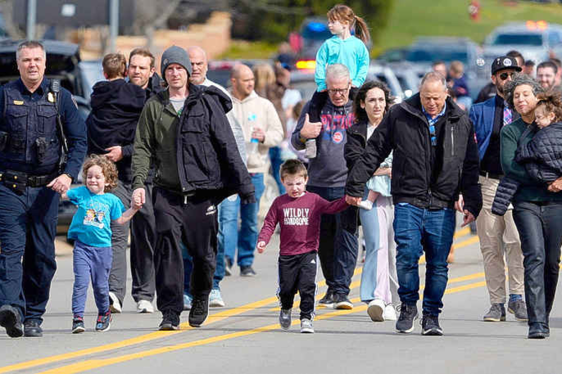 Suspect shot dead after crashing  truck into Detroit-area synagogue