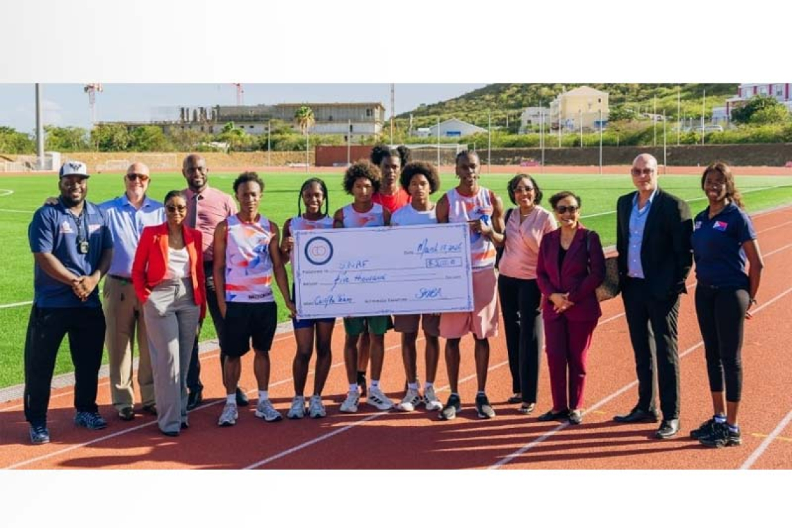 Bankers Assoc. donates $5,000  to Athletics Team for CARIFTA