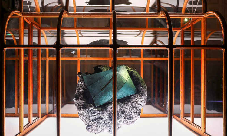 T-rex collagen used to create  one-of-a-kind teal handbag