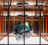 T-rex collagen used to create  one-of-a-kind teal handbag