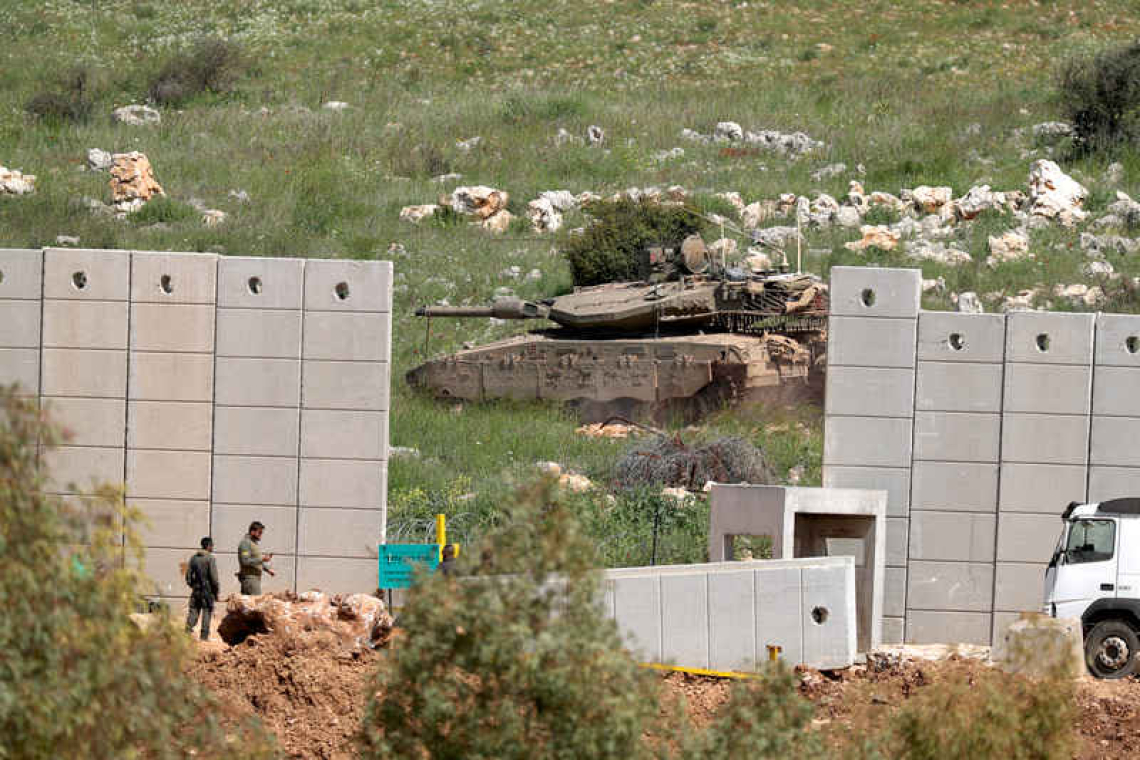 Israel presses assault on Lebanon border town ahead of talks in US