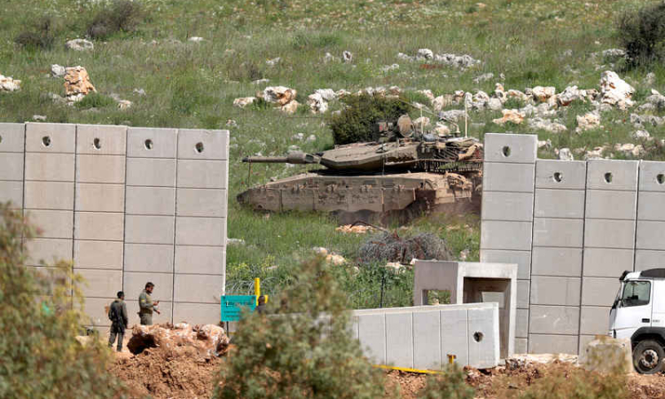 Israel presses assault on Lebanon  border town ahead of talks in US