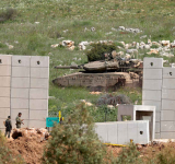 Israel presses assault on Lebanon  border town ahead of talks in US