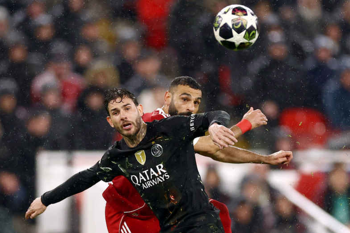 Dembele double at Liverpool fires PSG into Champions League semis  