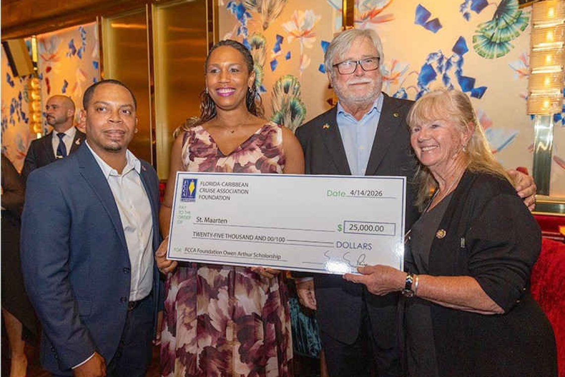 Grisha accepts Owen Arthur  Scholarship for St. Maarten