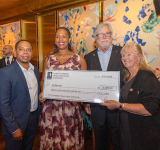 Grisha accepts Owen Arthur  Scholarship for St. Maarten