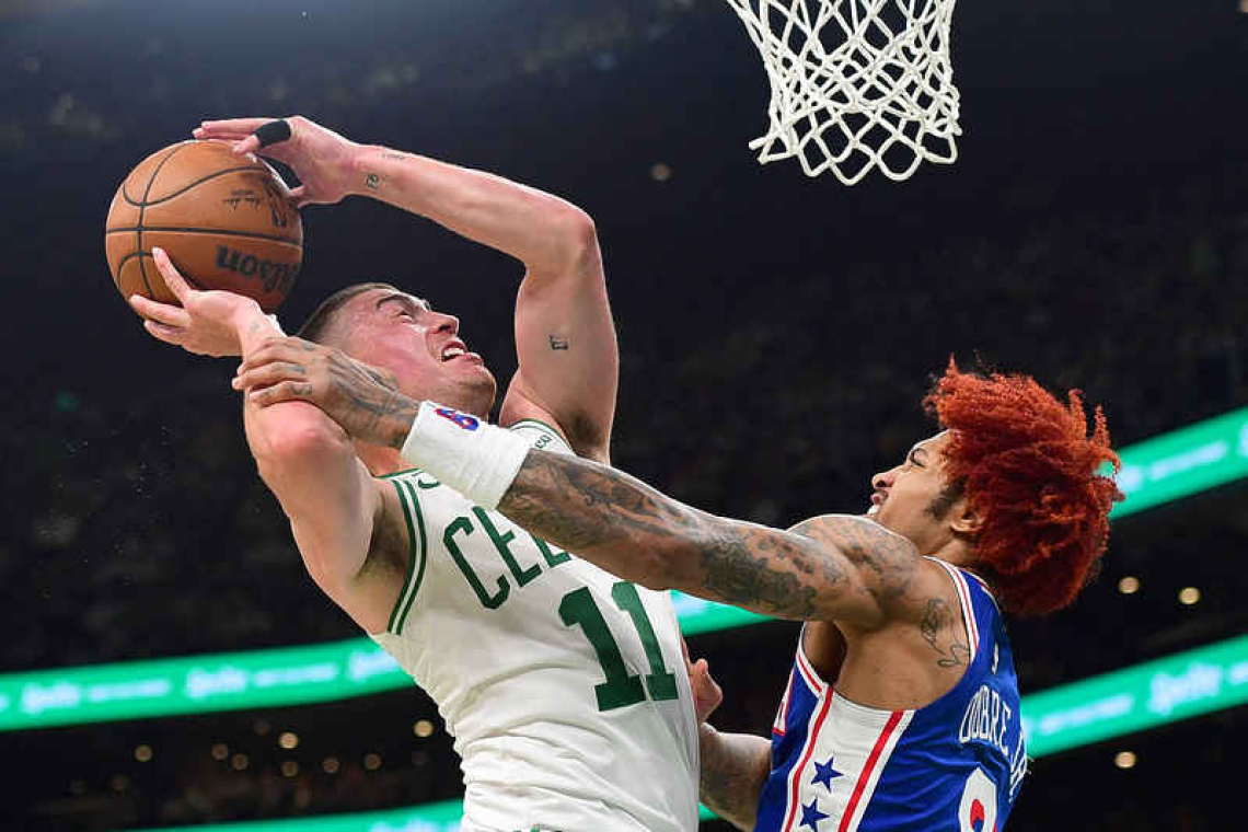 Celtics storm to early lead, roll past 76ers in series opener