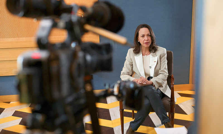 Machado plans to return home by  end of year, urges swift elections