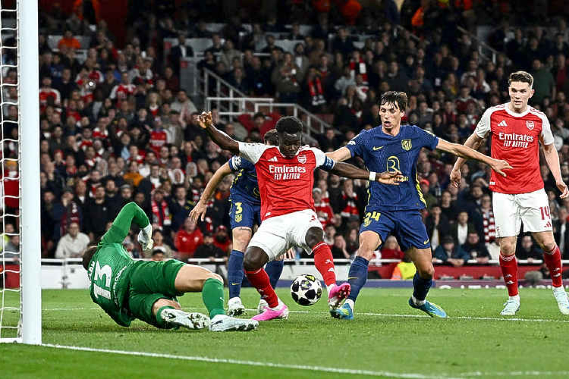 Saka sends Arsenal past Atletico into Champions League final  