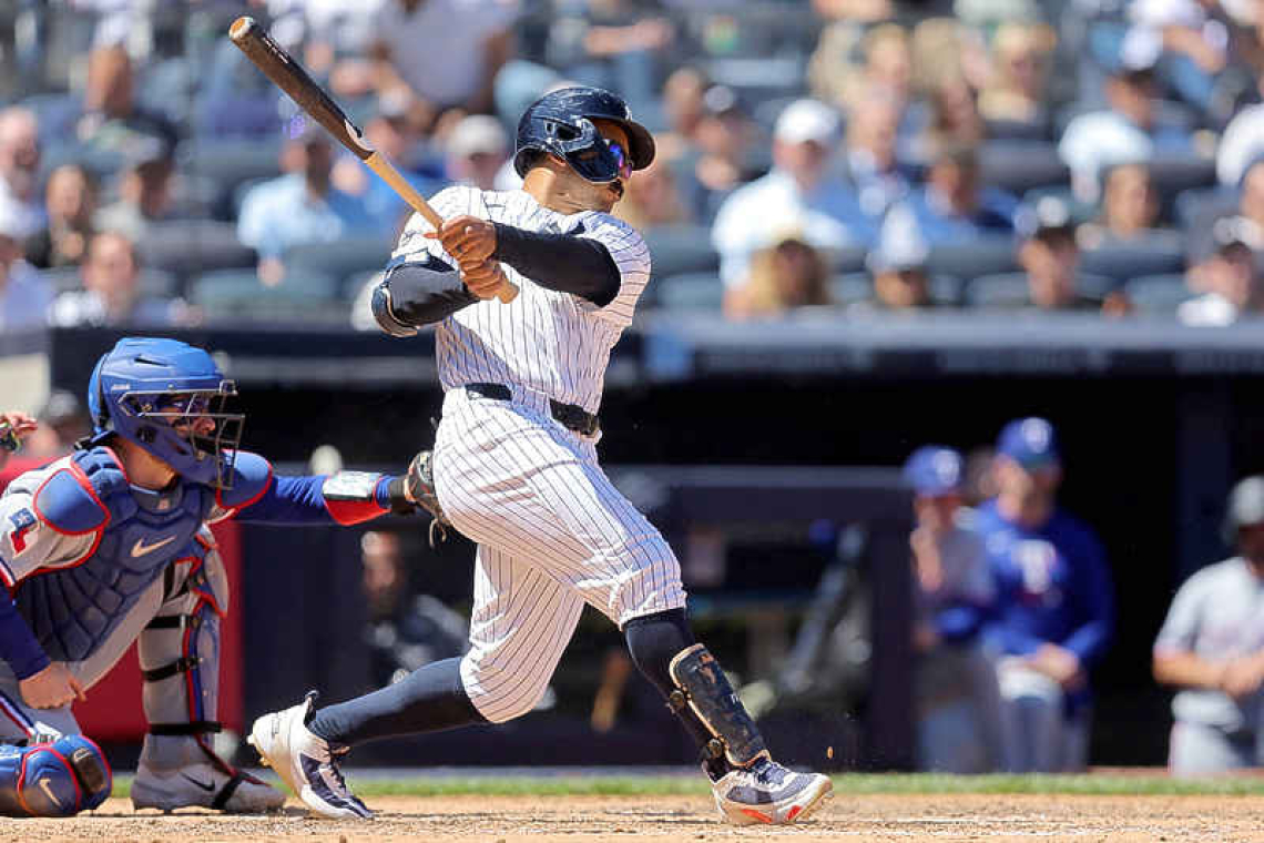 Yankees roll past Rangers with six-run outburst in sixth