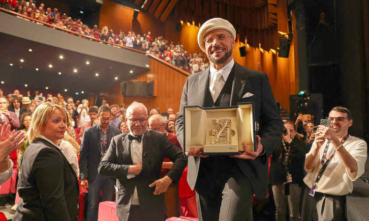 Travolta surprised with Cannes  award ahead of directorial debut