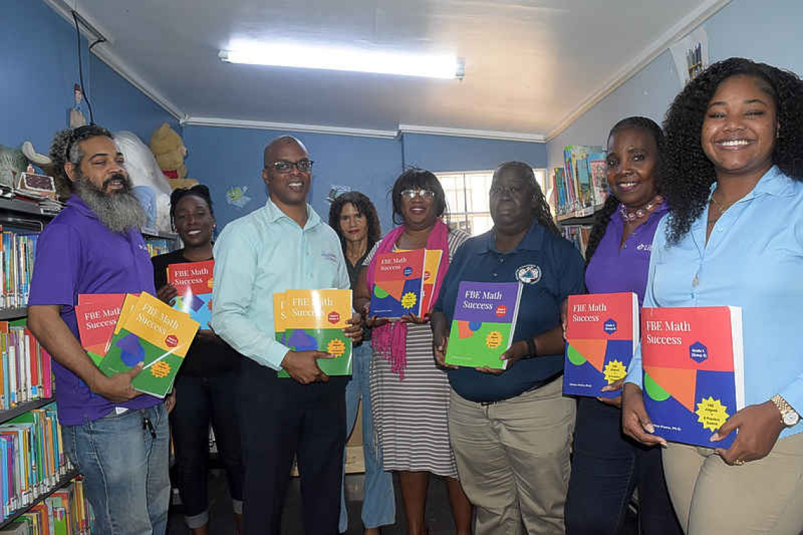 CLIMB Foundation donates  FBE Math books to library