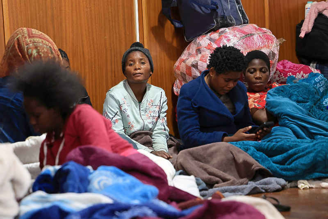 African migrants flee into the mountains as  South Africa's xenophobic violence surges