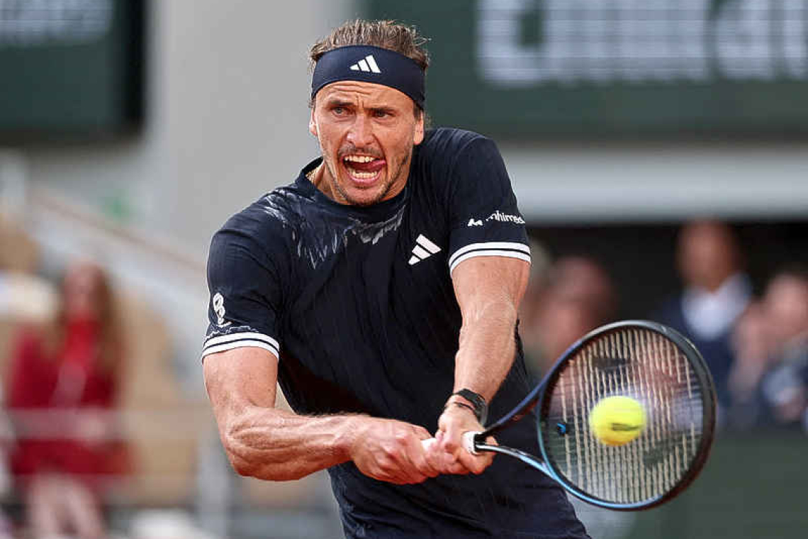 Zverev tears down the wall to enter Grand Slam winners' circle at French Open
