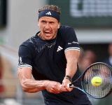 Zverev tears down the wall to enter Grand Slam winners' circle at French Open