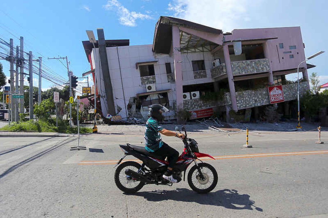 Powerful Philippine earthquake leaves at  least 32 feared dead, survivors recount fear