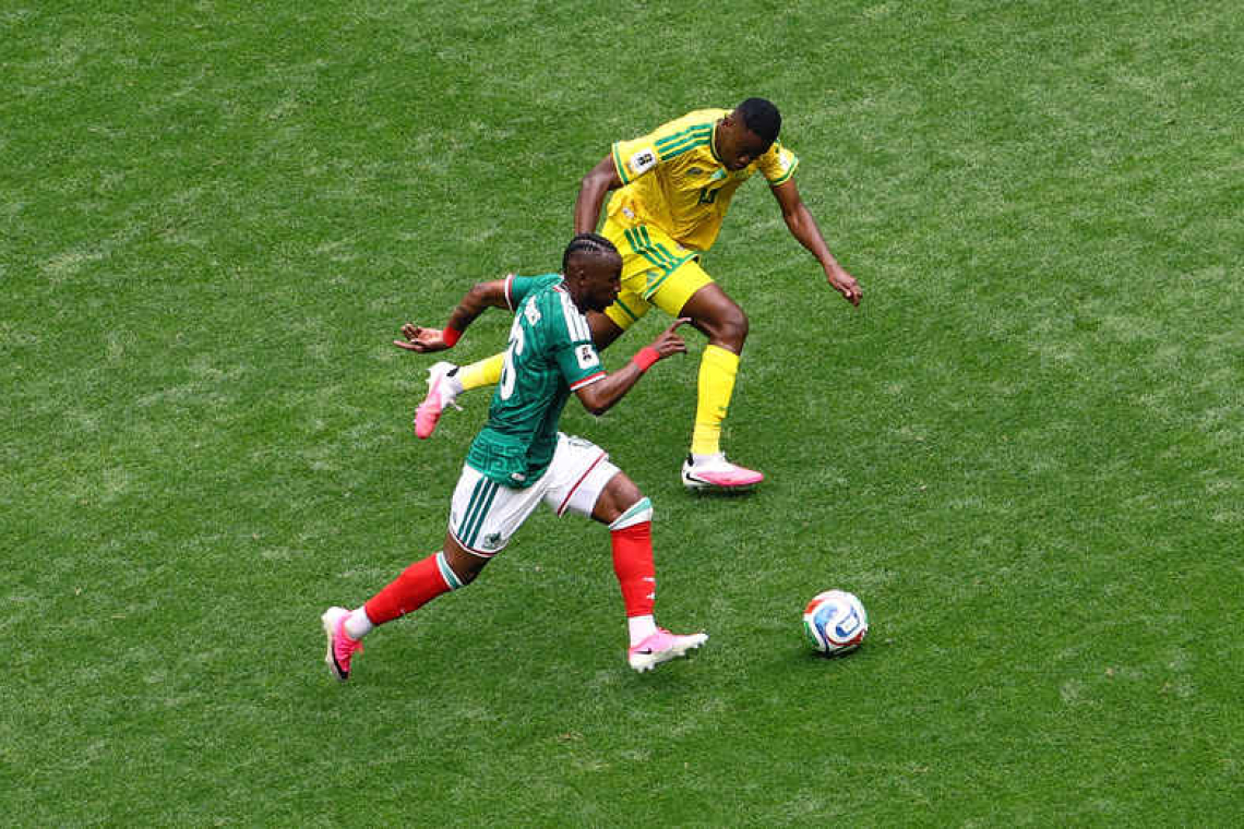 Mexicans celebrate breaking opening day curse with 2-0 win