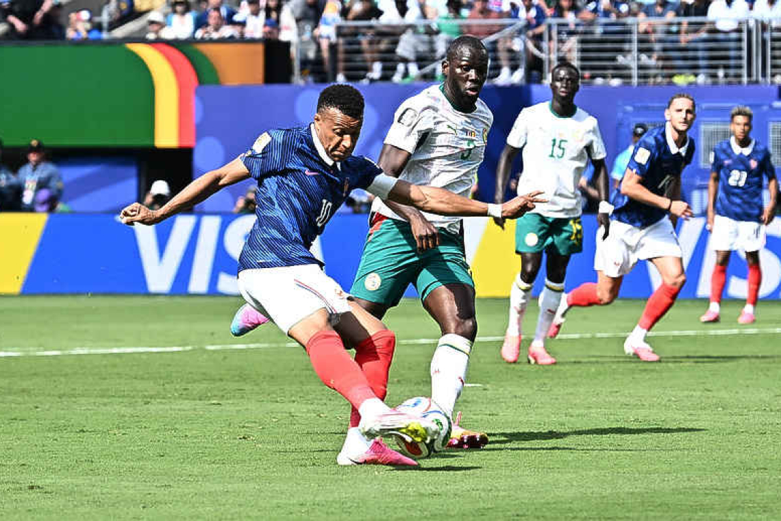 France win as Mbappe ignites World Cup opener