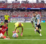 Milestone Messi sends Argentina to World Cup knockout stage