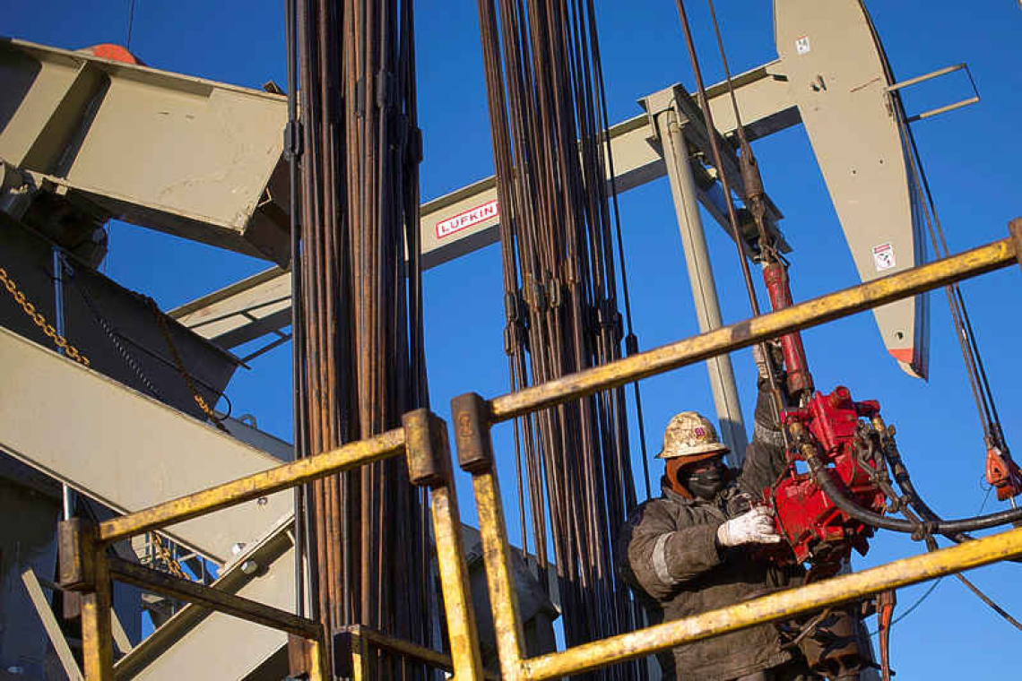American oil companies see big profit jump,  gird for clash over pump prices with Trump