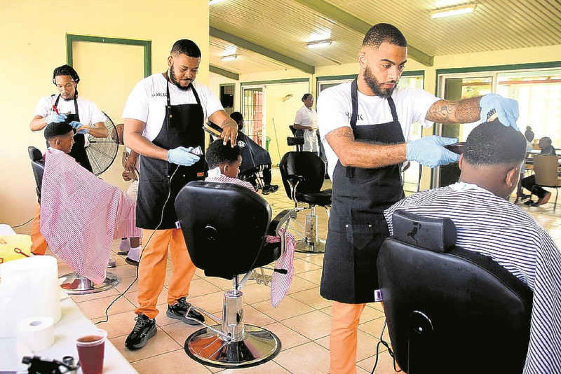 Over 300 kids get  haircuts for school