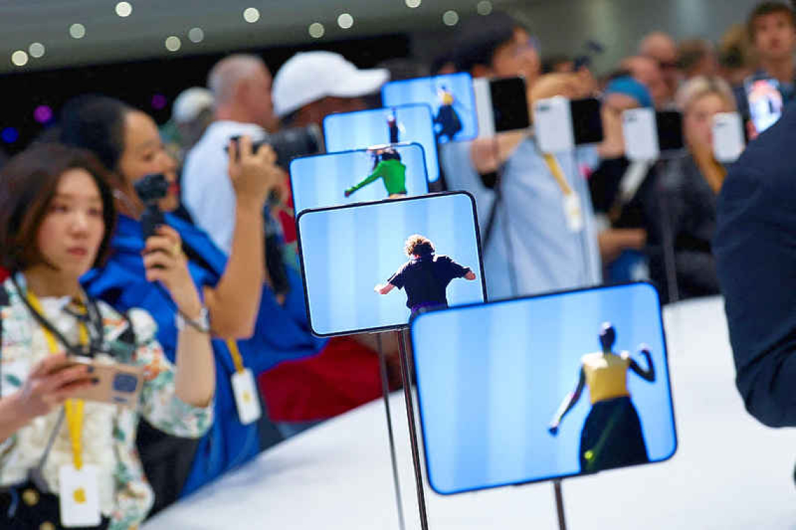Apple joins foldable phone race with $1,999 passport-shaped iPhone Duo