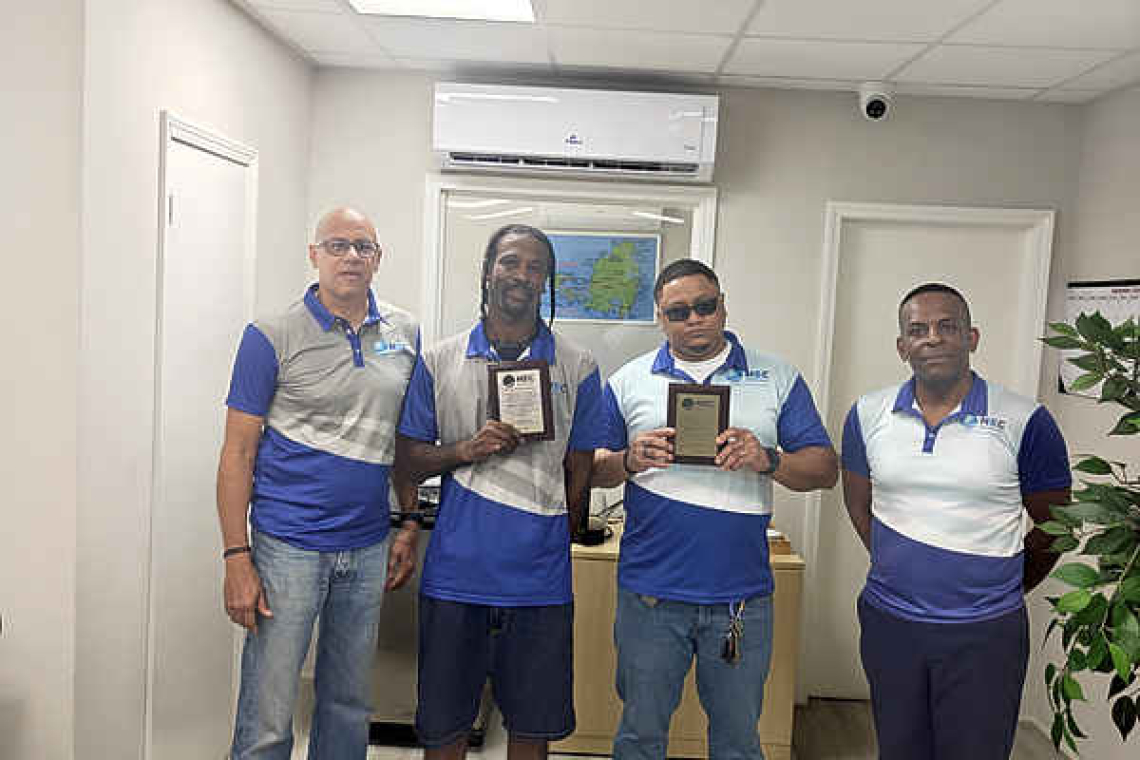 Two NEC Distribution staffers  mark 10 years with company