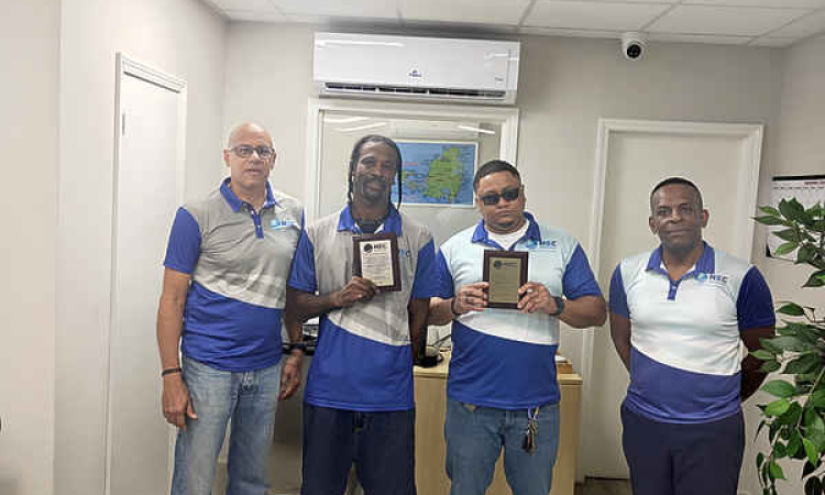 Two NEC Distribution staffers  mark 10 years with company