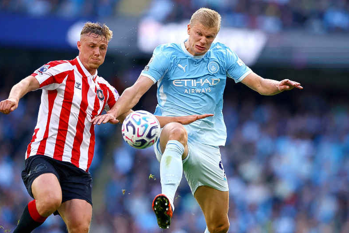 Goals galore keep Man City flying, but cracks remain at the back