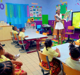 Queen of Essence & Mind inspires  Group 2 pupils through reading visit