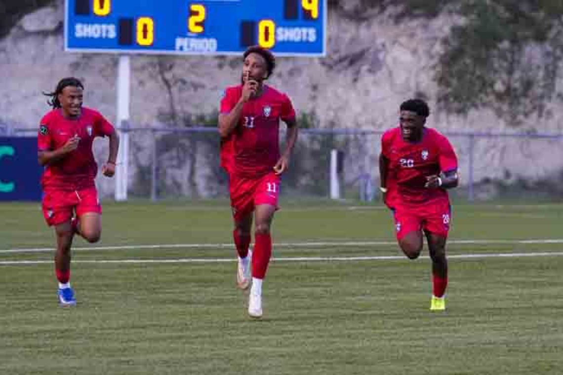 Goal galore from Saint Martin to keep the top of Group C