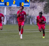 Goal galore from Saint Martin to keep the top of Group C